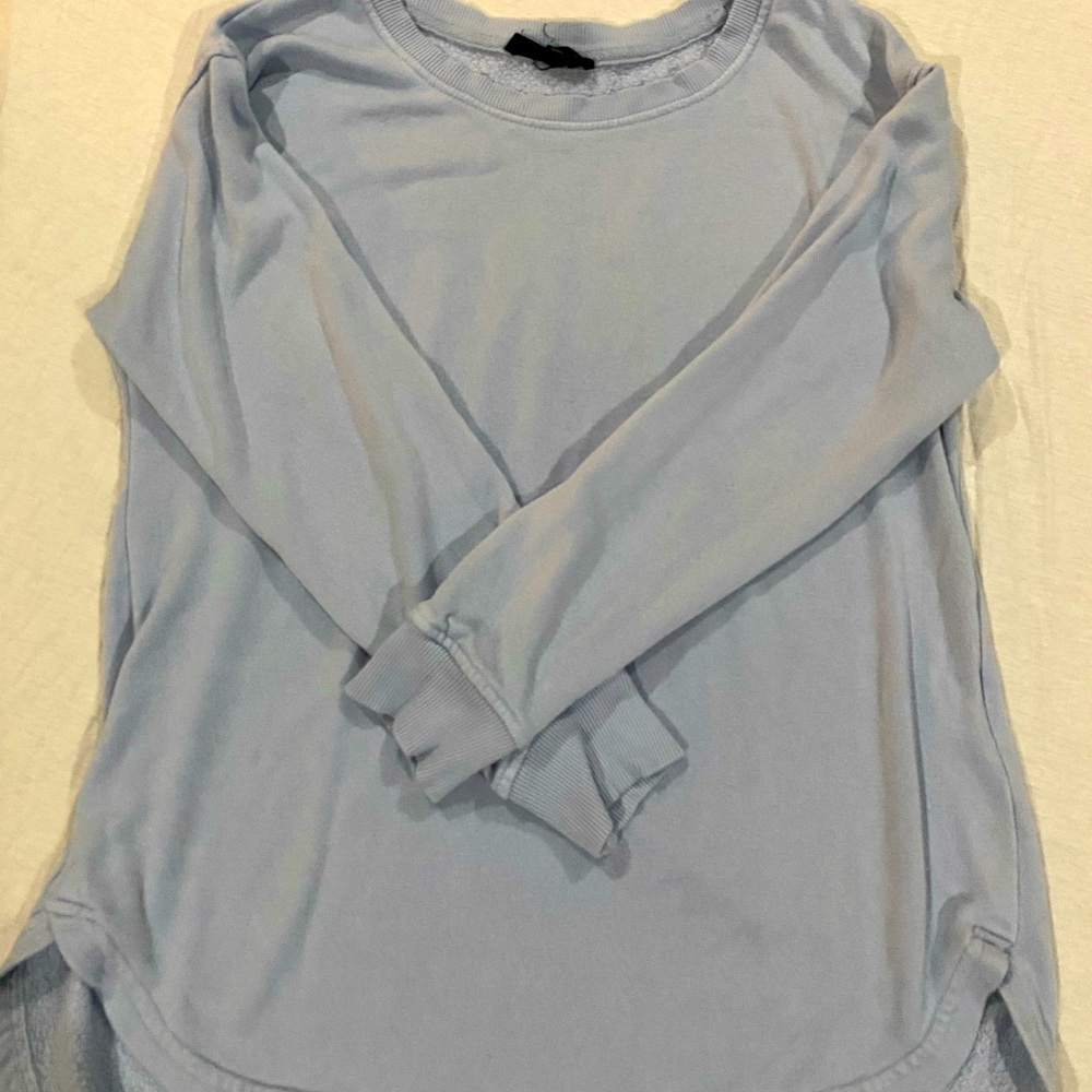 it’s a blue work causal top. never worn.